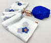 White Linen Saree with Blue Floral Print & Orange Accents | Elegant Printed Linen Saree for Women